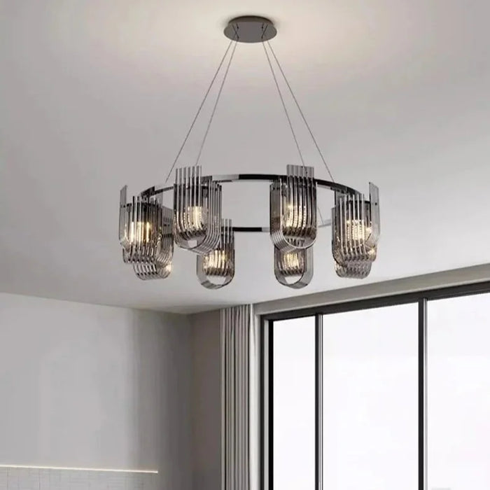 Calyx Halo Chandelier Pendant Light with smoked glass shades in a modern living room