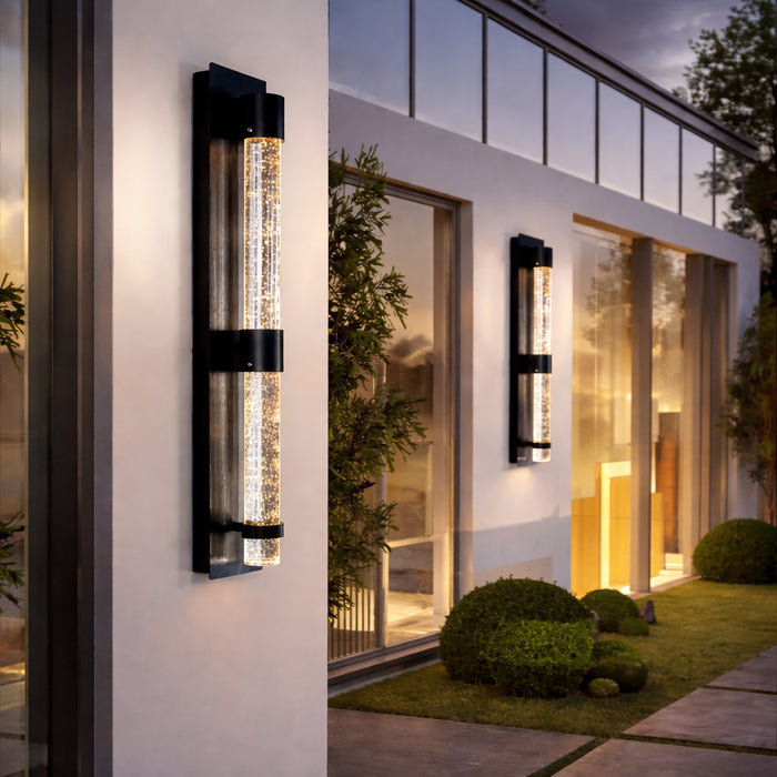 Aurelia Crystal Outdoor wall light in black with crystal tube on a modern house