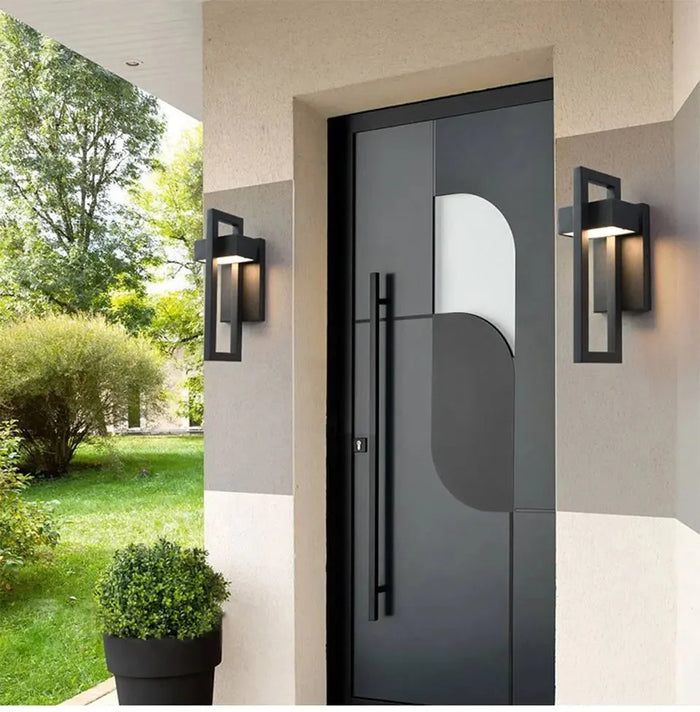 The Arcadia outdoor wall lights either side of a modern front door