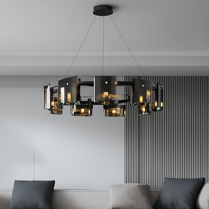 The Solara Chandelier in smoky grey glass above a living room