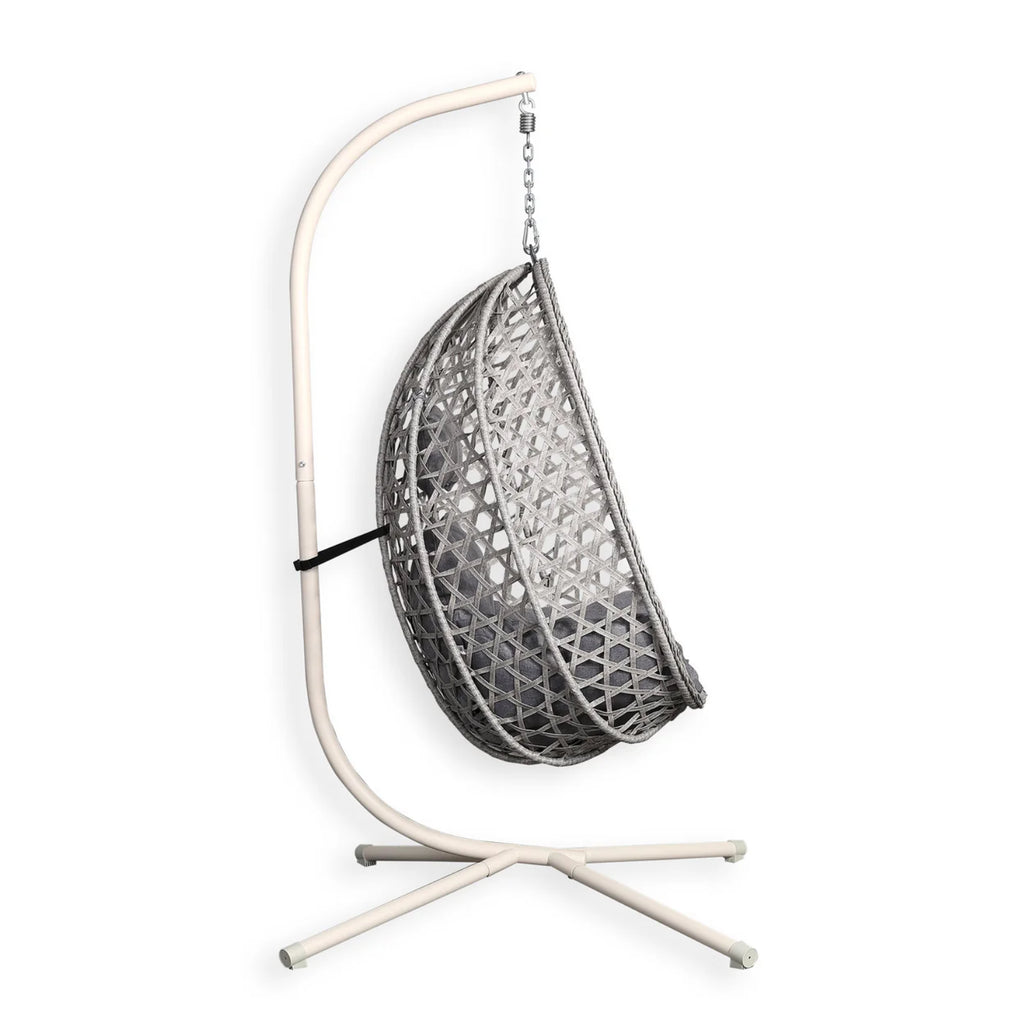 Vela Hanging Egg Chair – side view of the woven rattan egg chair frame and stand without cushions