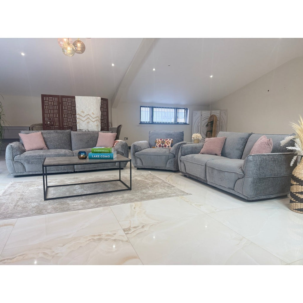 Grey Bergamo sofa set with plush padded seats and cushioned armrests, side view