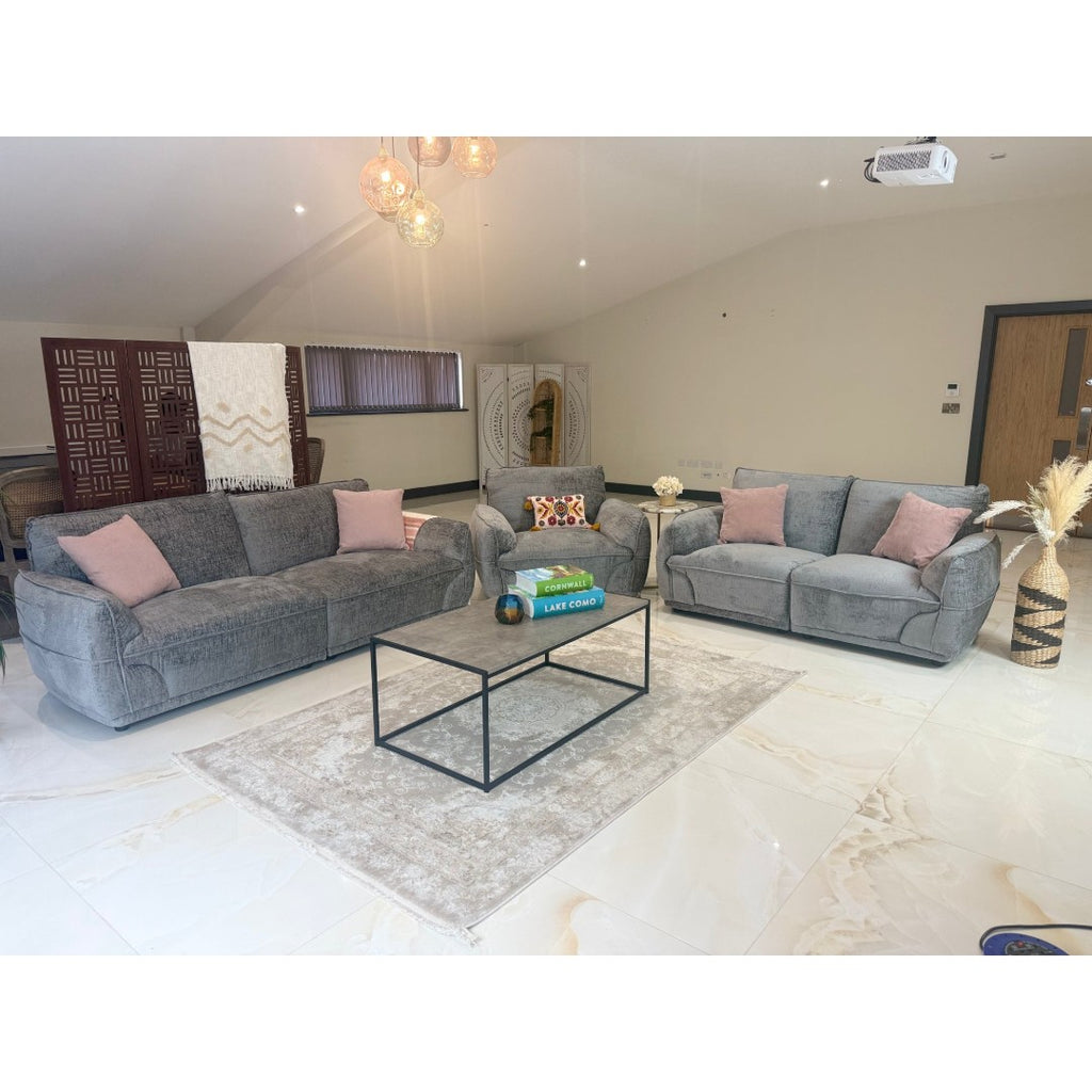 Bergamo 3 + 2 sofa set in grey textured fabric arranged around a coffee table