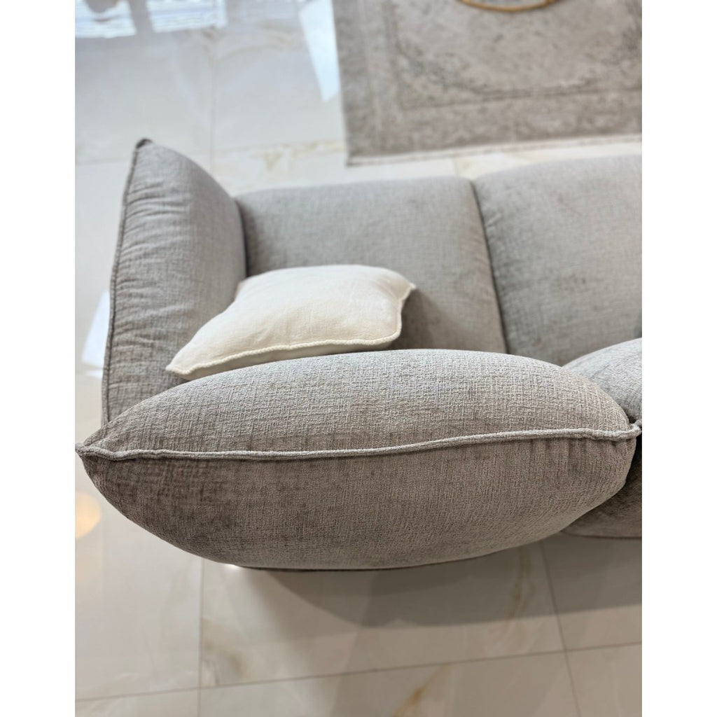 Close-up of the plush beige Bergamo seat and back cushions in soft-touch fabric