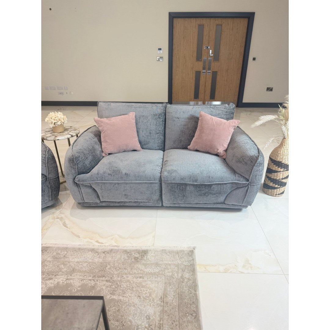 Front view of the grey Bergamo 2 seater sofa showing deep seats and high back