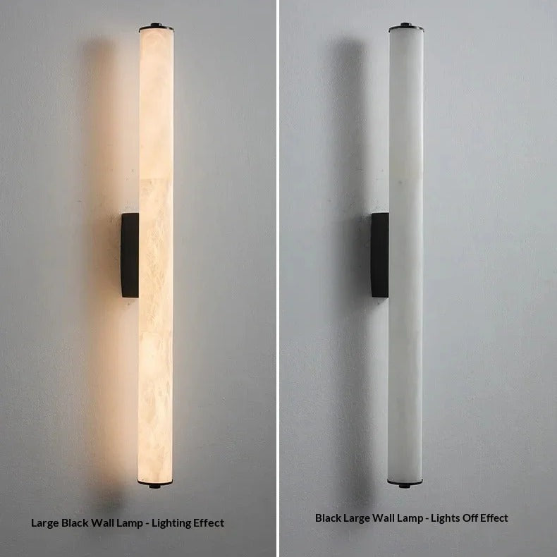 Calacatta black marble wall light shown switched on and switched off