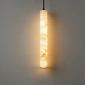 Calacatta natural marble LED pendant light glowing warm white against a grey wall