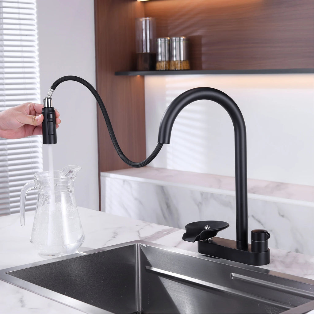 The Camden Pull-Out Kitchen Mixer Tap in Matte Black with flexible pull-out spray hose extended over a sink