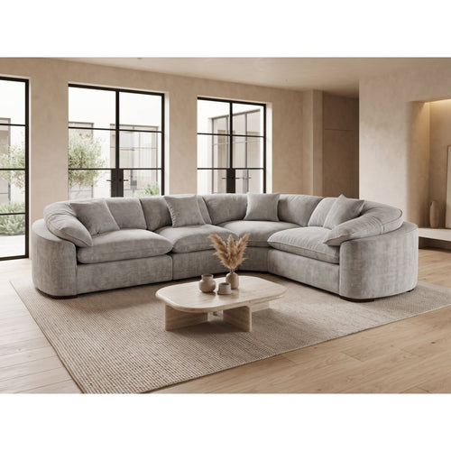 Helena large curved corner sofa in grey fabric with deep pillow-top seats in a bright modern living room