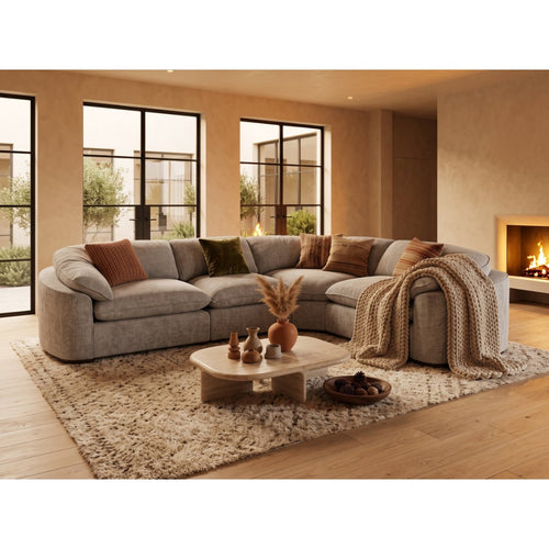 Grey Helena modular corner sofa styled with throw and scatter cushions beside a fireplace