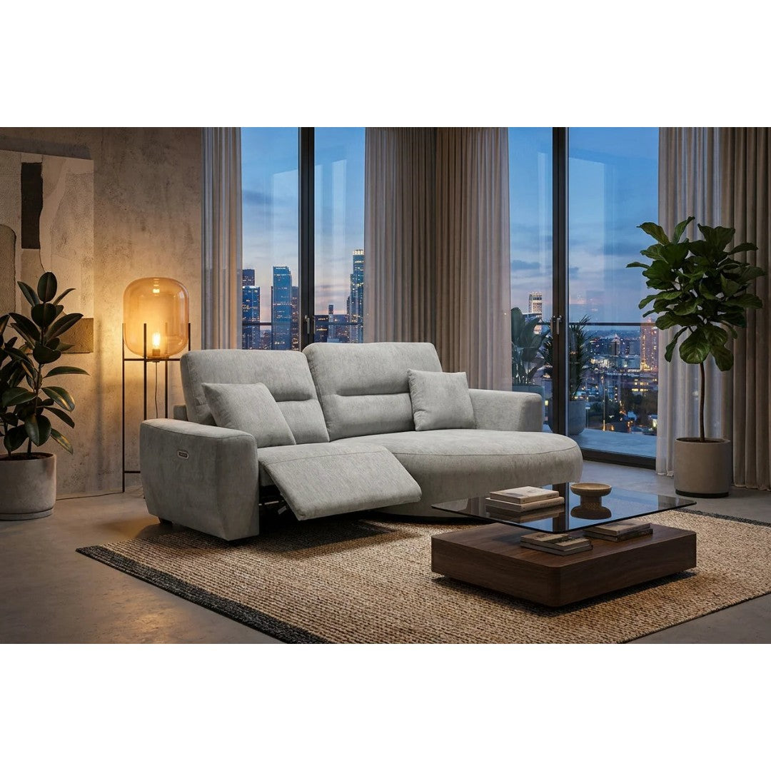 Lucca electric recliner corner sofa in grey, right hand curved chaise with footrest raised