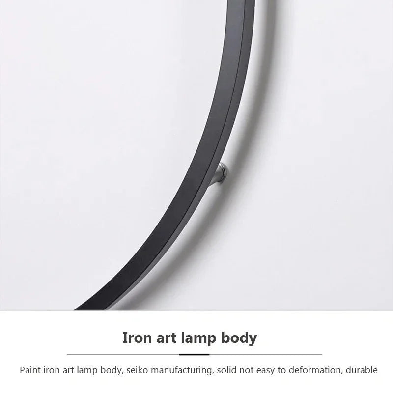 Luminous Halo V1 close-up of painted iron art lamp body showing premium build quality and durable matte black finish – designer LED wall light UK by Luxe Bespoke