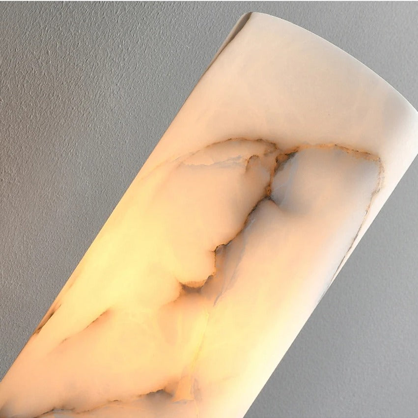 Close-up of the natural marble shade glowing, showing the stone's veining