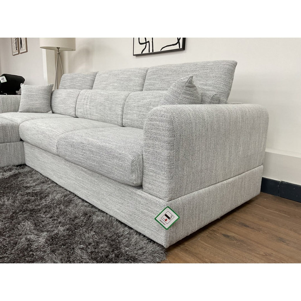 Close-up of the grey Milano sofa square arm and adjustable headrests