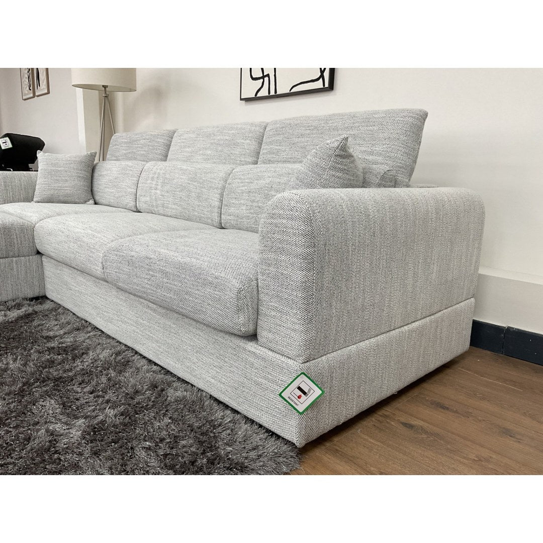 Close-up of the grey Milano sofa square arm and adjustable headrests