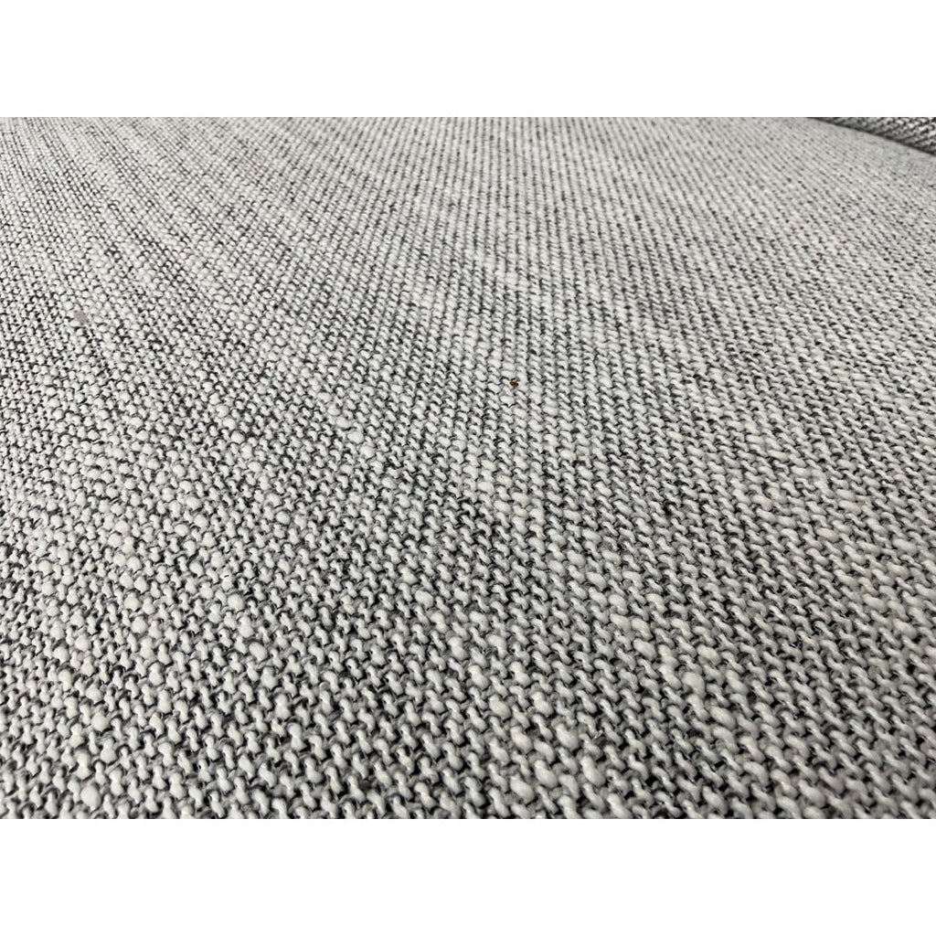 Rear view of the grey Milano corner sofa showing the fully upholstered back