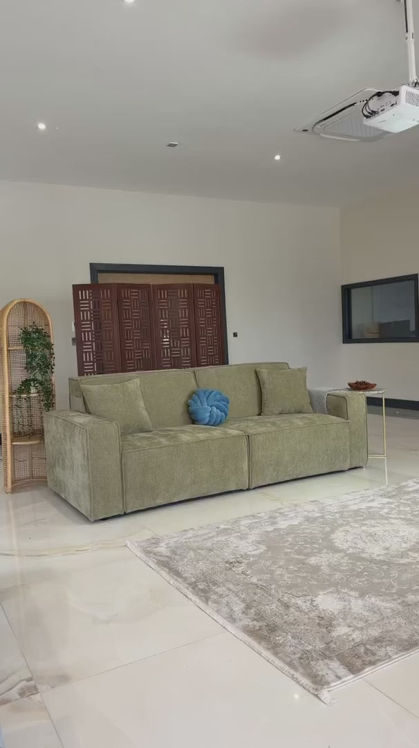 Video of the Siena electric sofa bed in a real living room showing the power sliding seats extending and closing