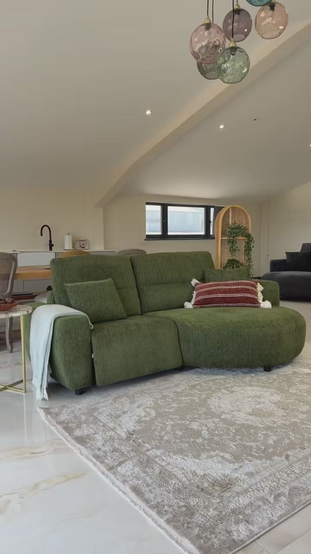 Video of the Lucca electric recliner corner sofa showing the curved chaise and power reclining seat