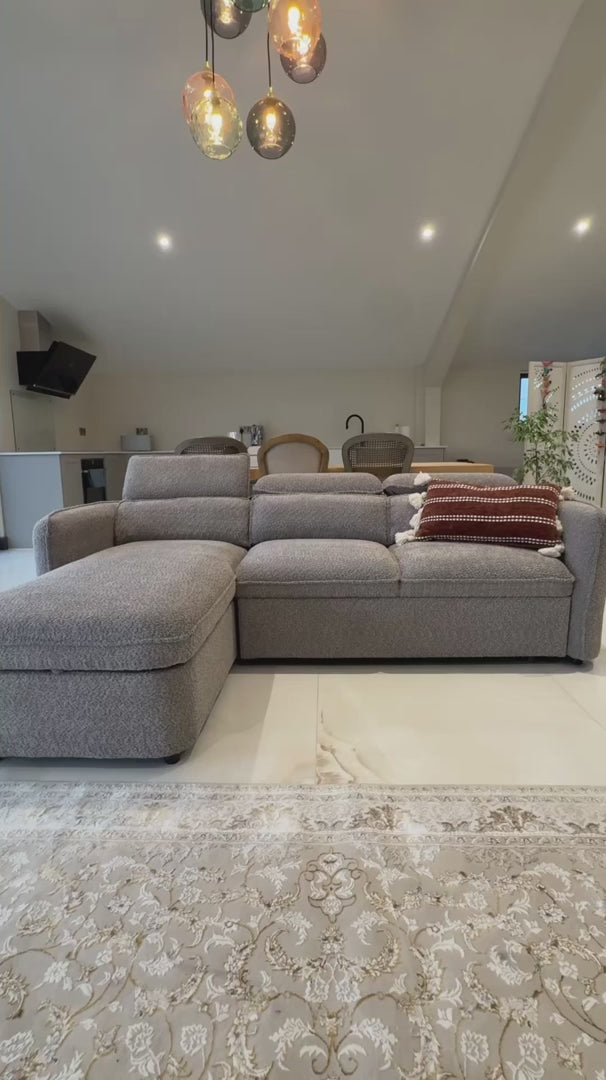 Positano corner sofa bed with storage video – showing the pull-out bed, hidden storage and adjustable headrests