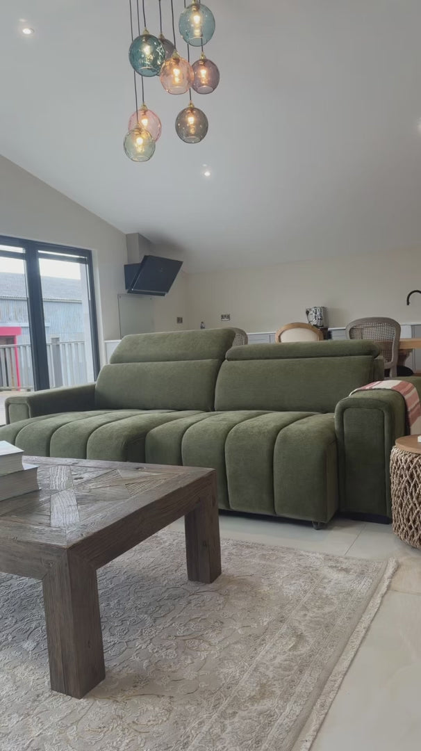Video of the green Verona electric sofa bed demonstrating the power sliding seats and adjustable headrests