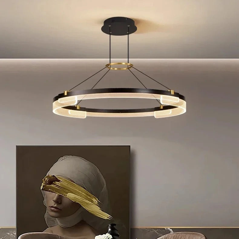 Radiant V1 halo pendant with brushed gold details in a modern living room