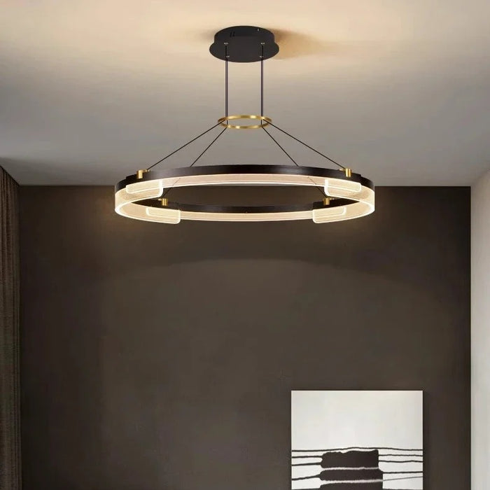 Radiant V1 LED ring pendant light lit in a dark grey interior