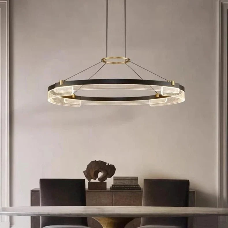 Radiant V1 ring pendant light hanging over a dining table