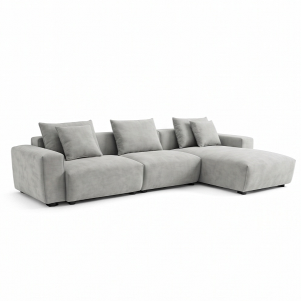 Taormina L-shape corner sofa in grey fabric on a white background, showing the long chaise and scatter cushions