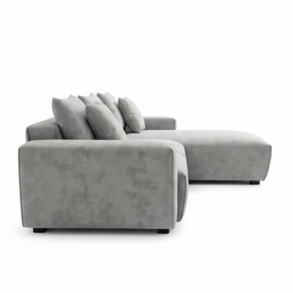Side view of the grey Taormina L-shape corner sofa showing its low profile, deep seat cushions and chaise
