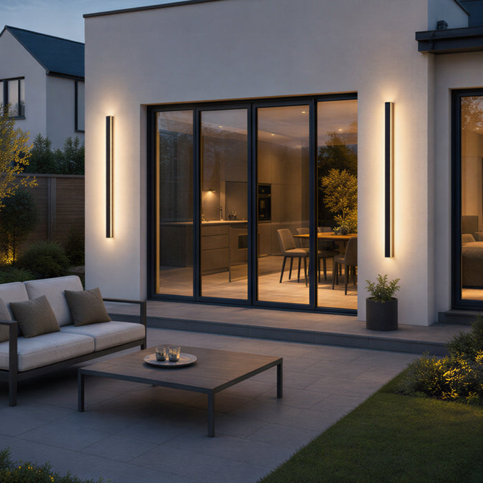 Luxe Elegance Outdoor Light long black LED wall lights on a modern house exterior at dusk